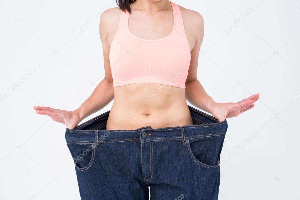 depositphotos_73435319-stock-photo-woman-showing-waist-after-losing
